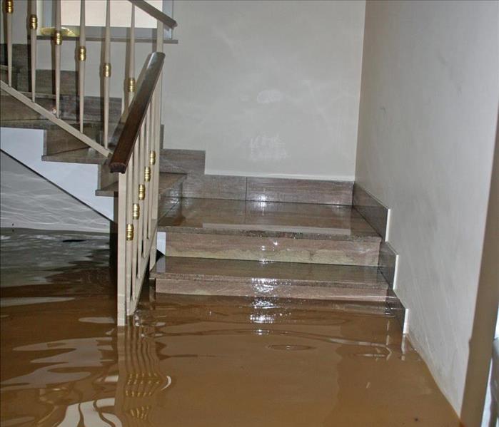 staircase of a house completely flooded during the river flooding